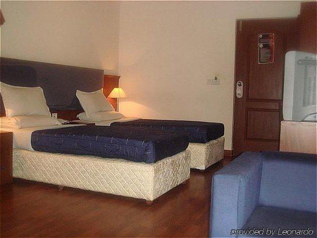 Hotel Noor Empire International Kormangala Bangalore Quarto foto